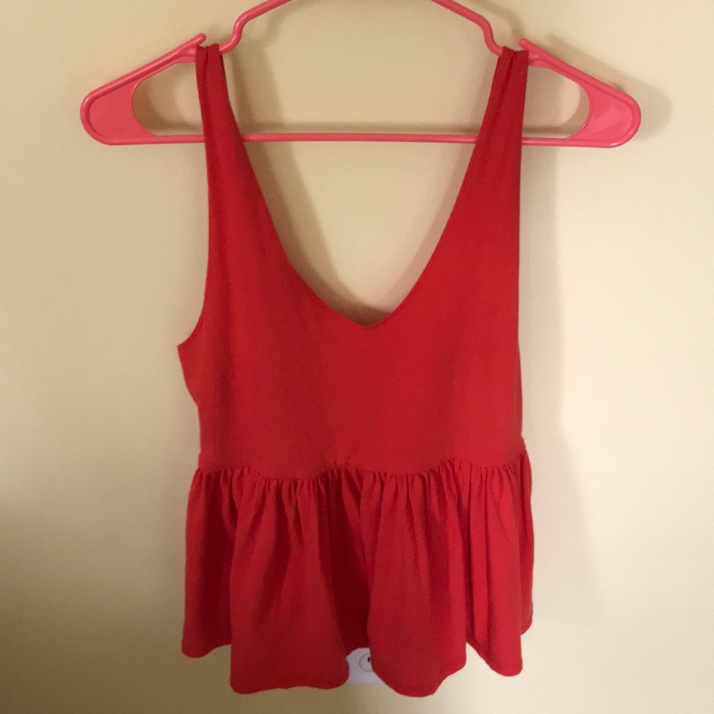 Coral Peplum shirt